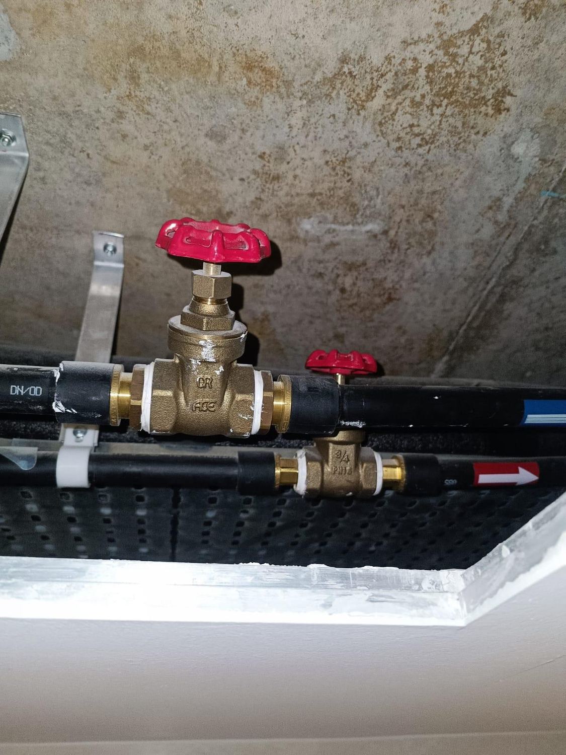 Brass gate valve replacement on riser pipes